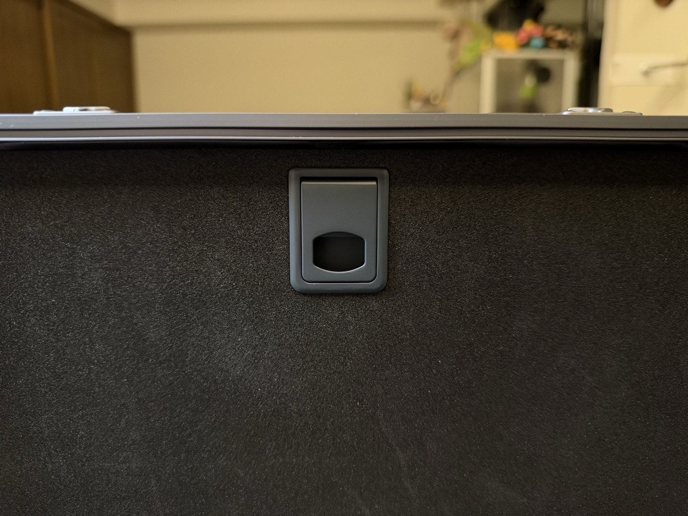 Close-up of the redesigned front panel catch on the current Kalijoy K CASE.