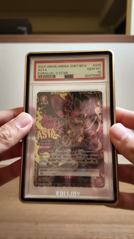 PSA 10 Union Arena Asta card in a gold-framed Kalijoy case, held in hand